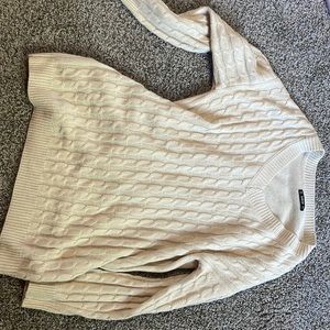 Cream color off the shoulder dress.